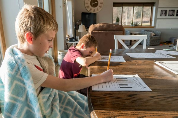 What's the Best Way to Create a Dedicated Space for Home-Schooling in a Living Room?